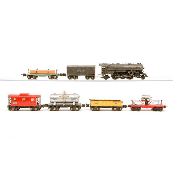 Lionel No. 224e, 2620, 2654, 2651, 2652, 2657: TRAIN. Lionel train set including: Ste+T (Gun Metal Gray) 224e, Searchlight (Modified) 2620, Tank 2654, Flat Car 2651, Gondola (Poor Condition) 2652, Caboose 2657.