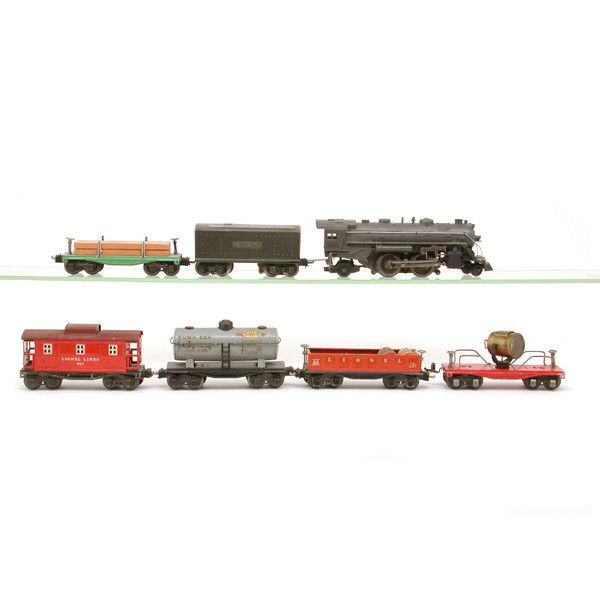 Lionel No. 229, 651, 654, 652, 320, 657: TRAIN. Lionel train set including: Ste+T 229, Log Car 651, Tank 654, Gondola 652, Search light 320, Caboose 657.