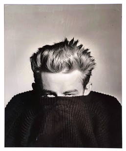 Phil Stern James Dean: Phil Stern, A tousled James Dean peers over his sweater, Los Angeles, 1955. Hand signed by Stern with artistâ€™s credit and address stamps on verso as shown. Image appx. 12" x 10"; Frame 21 1/2"