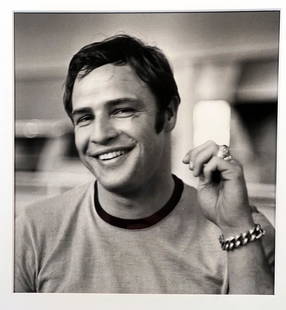 Phil Stern Marlon Brando, 1954: Phil Stern, Marlon Brando - 1954. Titled, dated and hand signed by Stern with artistâ€™s credit and address stamps on verso as shown. Image viewed appx: 10" x 9 3/4"; Frame: 21 1/2" x 17 1/2".