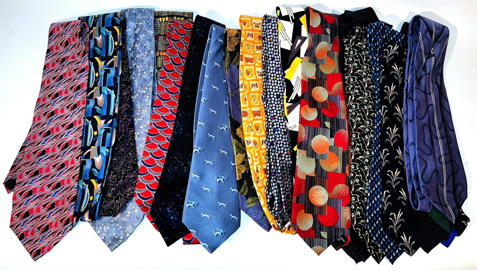 Grouping of 20 Designer Ties: Grouping of 20 Designer Ties to include: Zegna, Baldasarri, Bolgheri, Brioni, Selini, Mouley, Dion, Jeraz, Lanvin, Kenzo, Messori, Fumagallis, Pancaldi, Jhane Barnes, Buchner, etc.