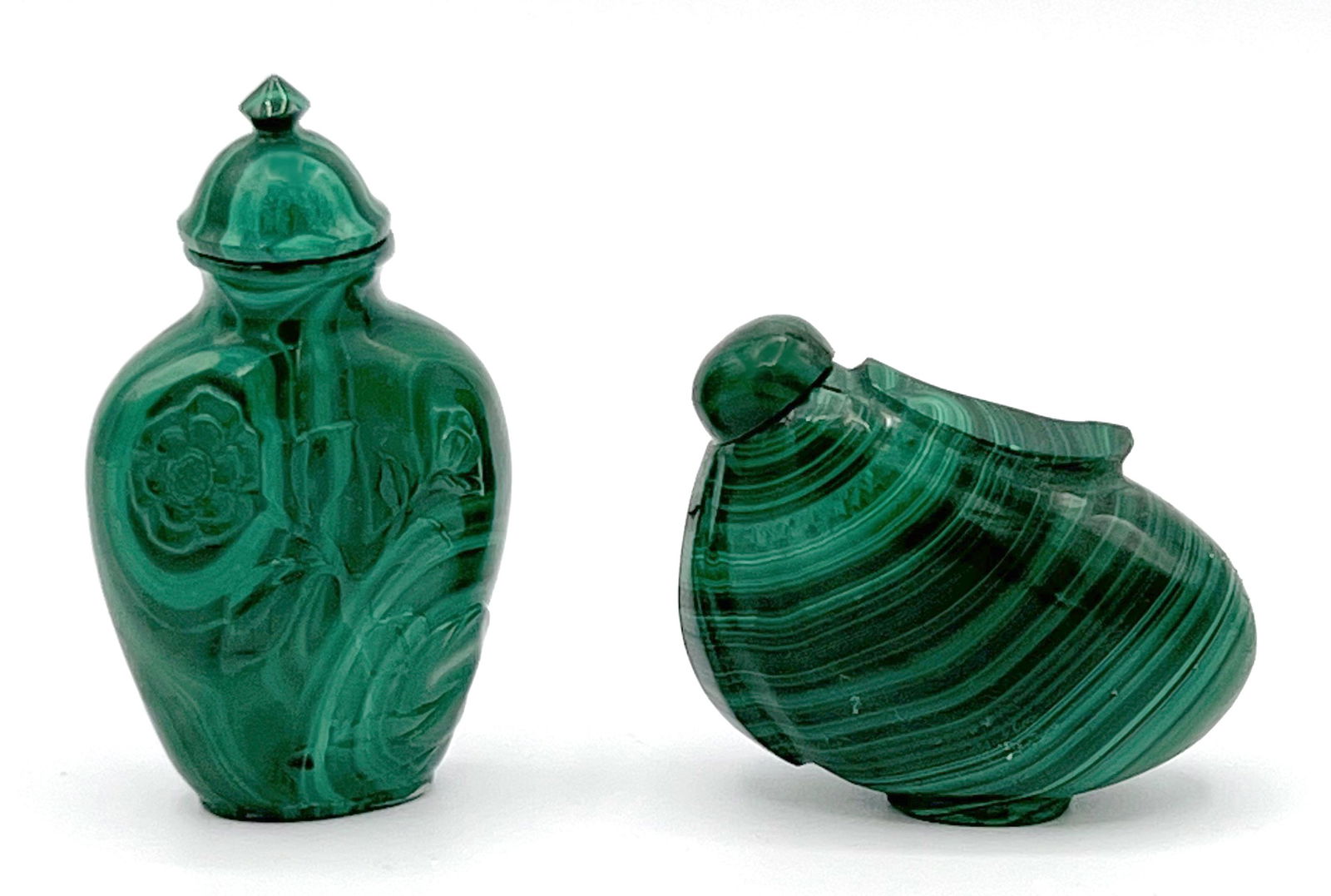 2 Malachite Snuff Bottles: 2 Malachite Snuff Bottles, one floral carved (2 1/4" tall) and the other asymmetrical: 1 1/2" wide.