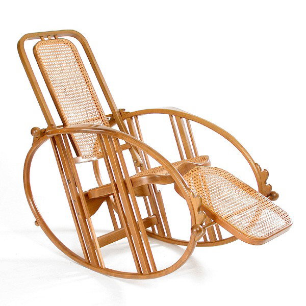 Thonet Style Rocker: ROCKER. Thonet style bentwood rocker, having turned rods for adjustment and caned panels, 42"h x 28 1/4"w x 64"d. In very good condition, with minor abrasions