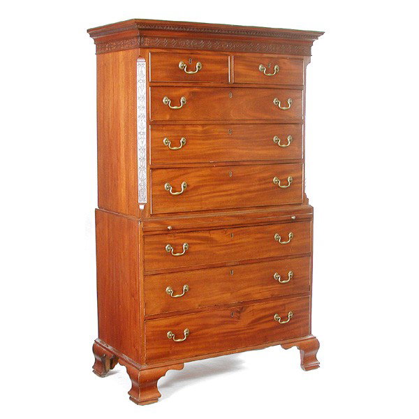 Georgian Mahogany Chest on chest: CHEST ON CHEST. Georgian mahogany chest on chest, having a molded cornice having Greek key banding, cock beaded drawers, the center having a pull out surface, with applied open work frieze and canted 