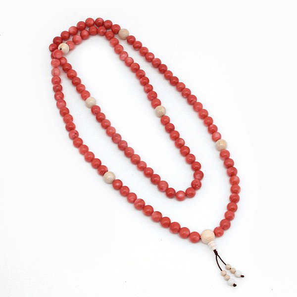 Prayer Beads, Coral & Ivory: PRAYER BEADS. Coral/Ivory Buddhist Prayer Beads, consists of 108 round coral beads inter spaced with seven marine ivory beads, bead dia 1/2", overall length 49".