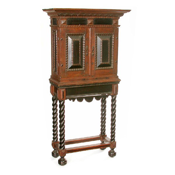 Early Continental Reliquary on Stand: RELIQUARY. Early Continental reliquary, having a molded cornice, low relief carved banding, rising on a stretchered twist pilaster base terminating on bun feet, early hardware and lock, 50"h x 25 3/4"