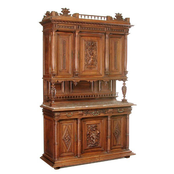 Continental Neoclassical Carved Walnut Buffet: BUFFET. Continental walnut buffet, executed in the neoclassical style, the top section center cabinet door carved with a nude winged figure and supported by fluted columns, the middle section with mar