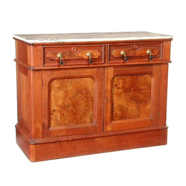 American Victorian Walnut Sideboard: SIDEBOARD. American Victorian walnut sideboard having marble top, two drawers above two doors with burled panels and teardrop pulls, 36 1/2"h x 47 1/2"w x 20 1/2"d. In original finish, crack and old r