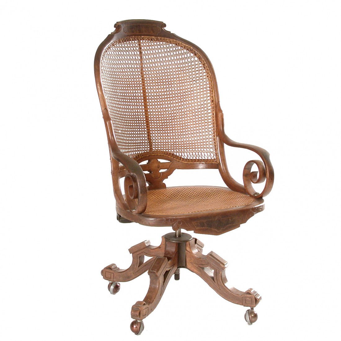 Fine American Victorian Walnut Desk Chair, 19th c.: CHAIR. Fine American Victorian Walnut Desk Chair, 19th c. Caned seat and back, swivel base, bentwood arms and original finish. Good condition. 44 1/2"h x 25"w x 29"d.