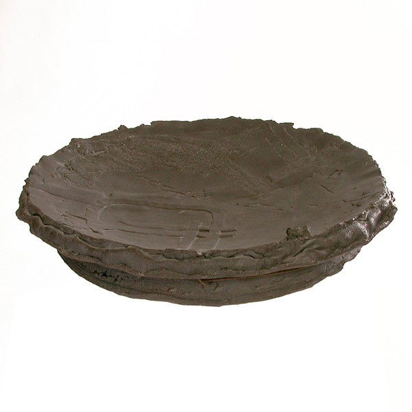 Don Reitz Stoneware Charger: CHARGER. Stoneware charger by Don Reitz, signed to base, 23"d. In good condition.