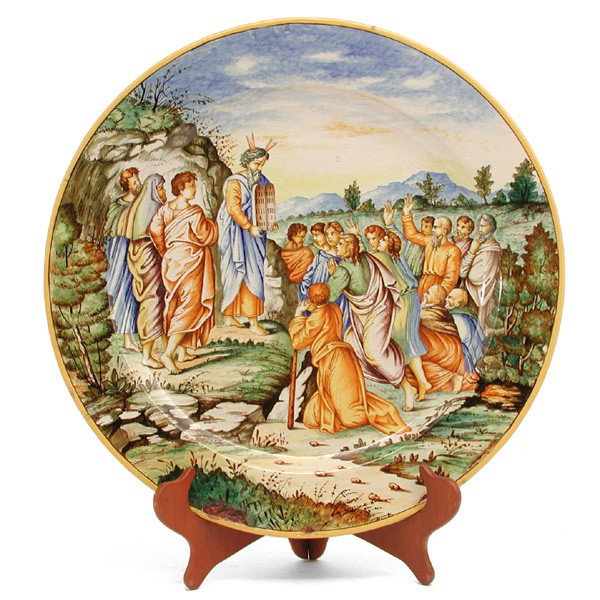19th c Italian Majolica wall plaque, M. Pesaro: PLAQUE. 19th century decorative painted Italian Majolica wall plaque, stamped M. Pesaro on reverse, Moses presenting the 10 commandments, 19 3/4" diameter