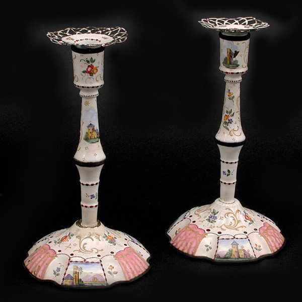 Pair of Enameled Candlesticks, 19th c., 9" tall: CANDLESTICKS. Pair of Enameled Candlesticks, 19th c., scenic and floral enamel against a white ground, minor losses to parts of the enameling, 9" tall