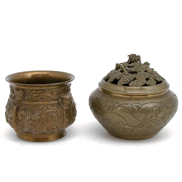 2 Japanese Bronze Censors, one open, one covered: CENSORS. 2 Japanese Bronze Censors, one open top with repousse body & the other with carved body and openwork cover, both marked, 3 1/4"h x 4 1/4"d & 4 1/2"h x 5"w.