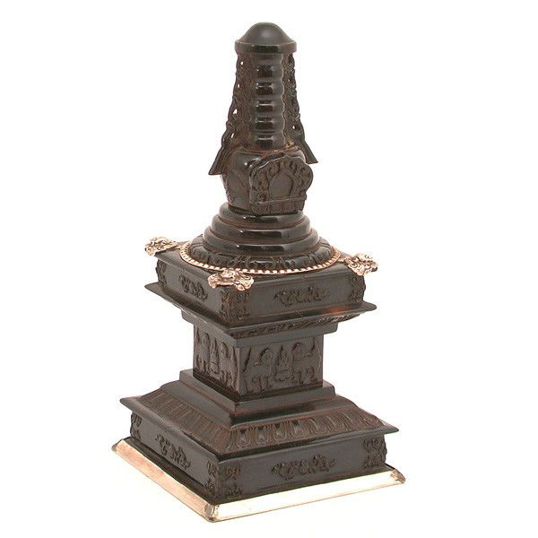 Tibetan Carved Rhinoceros Horn Stupa: STUPA. Tibetan Carved Rhinoceros Horn Stupa. The exterior carved with religious symbols and mounted with silver decorations, height 7.9 inches(Estate of Bruce Brasher, Northern California)