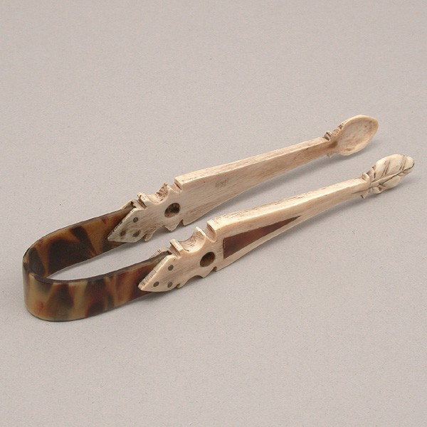 Fancy Antique Whalebone Sugar Tongs, 19th c, 4 7/8": SUGAR TONGS. Fancy 19th c carved whalebone and tortoiseshell sugar tongs, brass pinned, 4 7/8".