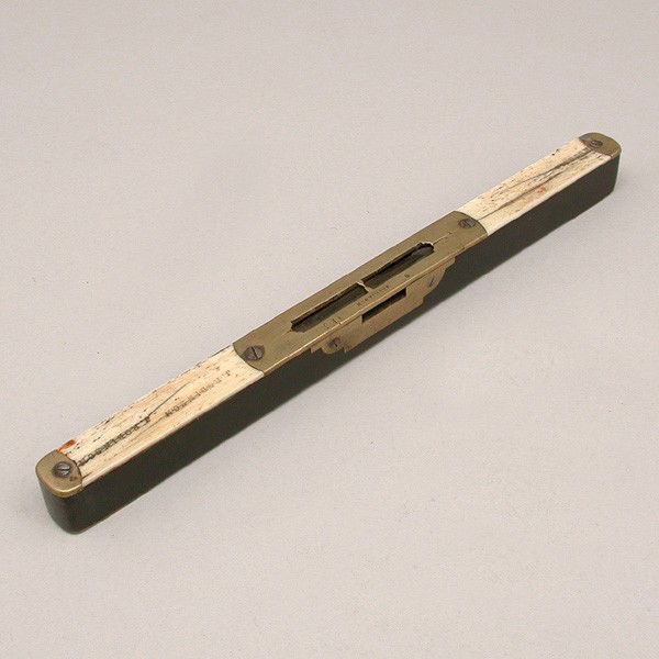 Matheson Ebony, Brass, and Whalebone Level, 19th c: LEVEL. Beautiful 19th c. Ebony, Brass, and Whalebone Level. Made by 'Matheson' (England), 1830 - 1850. 11 inches long with a double top ports and inlaid brass. Owner stamps lightly on the top. Very ra