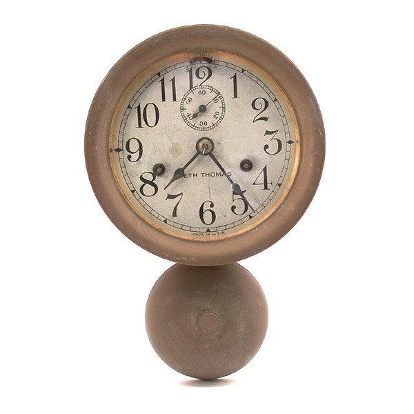 Brass Seth Thomas Ship's Clock, outside Bell: CLOCK. Brass Seth Thomas Ship's Clock with Bell. The clock has an outside bell and is trying to run but needs a cleaning. Strikes ships bells. The clock is in original untouched condition. Measures 7"