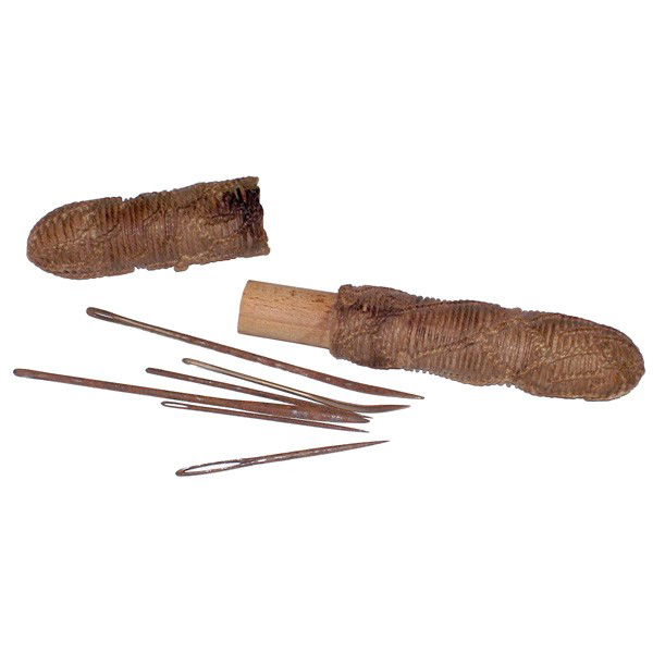 Sail maker's needle case: NEEDLE CASE. Sail maker's needle case. This knot work covered wooden needle case is 6 3/4" in length. Some staining, otherwise in very good sound condition. Several needles in case.