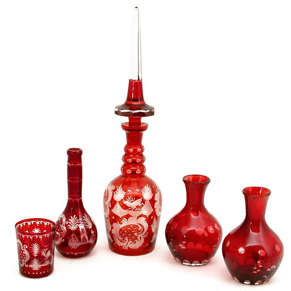Lot of Ruby Glass, Five (5) Pieces: LOT. Lot of ruby glass to include: tall decanter, two open top decanters, tumbler, and bud vase. All with etched designs, tallest: 19.5", good condition.