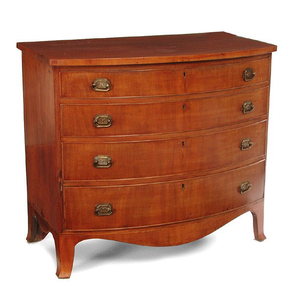 Hepplewhite Chest of Drawers, 19th century: CHEST. 19th century Hepplewhite chest of drawers. The mahogany bow front chest with four graduated drawers above a shaped skirt and flared legs. 34.5" h x 39" w x 22.75" d. Very good condition with mi