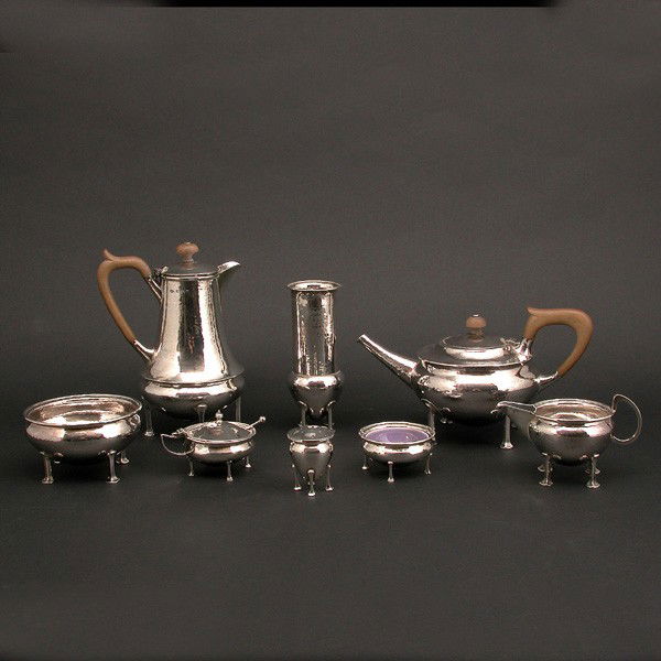 A.E. Jones Sterling Coffee and Tea Service: SET. A.E. Jones sterling silver coffee and tea service, including: coffee pot, tea pot, sugar, creamer, lined covered chocolate, lined lemon dish, cinnamon shaker, and vase. All hallmarked, in very go