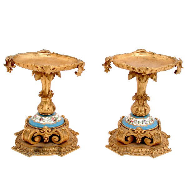 French Gilt Bronze Garniture with Sevres Separator: GARNITURE. French Gilt Bronze Garniture with Sevres Separator, ornately cast with grapevine motif at top, 18th/19th c., 8 3/4" tall, very good condition.