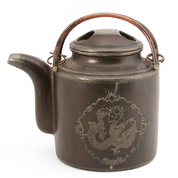 Chinese Ceramic Kettle, Republic, Metal Decoration: KETTLE. Republic Period ceramic kettle with dragon metal decoration and handle, mark at bottom. 12" h x 12" w x 8" d.
