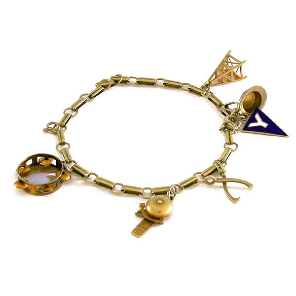 14K Gold Charm Bracelet Enamel & Abalone Charms: BRACELET. 14k yellow gold charm bracelet, circa 1930s, including an abalone tambourine, alarm, top hat, enamel Yale fraternity charm and more.