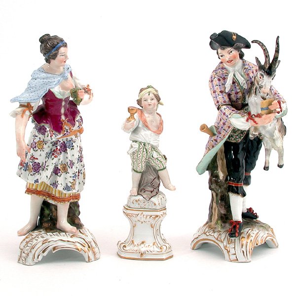 KPM Porcelain Figures (3): FIGURES. Lot of 3 KPM porcelain figures to include: a figure of a man with a goat and instruments, mark at bottom; a figure of a lady with gourd, mark at bottom; and a figure of a boy with a goblet on