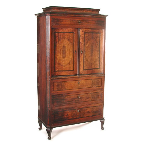 Early 19th Century Danish Walnut Sideboard: SIDEBOARD. Early 19th century Danish walnut sideboard in the Biedermeier style. The rectangular shape accented by string inlaid ebony and book matched burled walnut. The pediment top above a drawer an