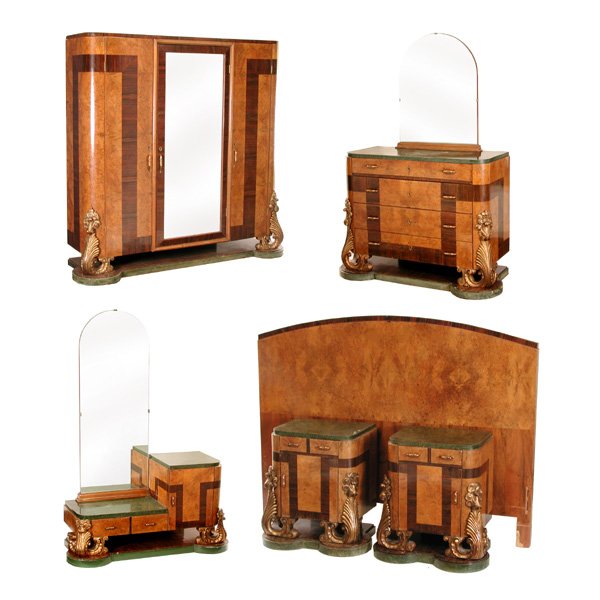 Magnificent Italian Art Deco Bedroom Set: BEDROOM SET. Magnificent Italian Art Deco bedroom set with multi-wood veneer, bakelite tops and bottoms and ornate gilt carved floriform supports. Set consists of one armoire, one mirror-back dresser,