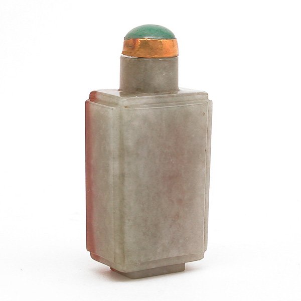 Chinese Jade Snuff Bottle: SNUFF BOTTLE. Chinese jade snuff bottle, four sided, pale green and brown, with jadeite stopper. 2.375" h. Property of a San Francisco family, purchased in the late 19th/early 20th century.