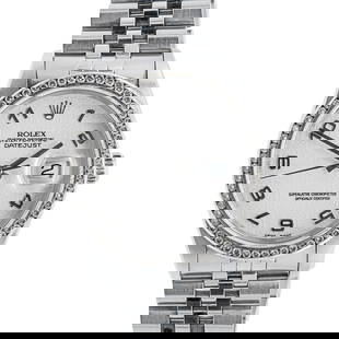 Men's Rolex Datejust Watch with Diamond Bezel: Men's Rolex Datejust watch, stainless steel case with Jubilee bracelet. Jubilee "Anniversary" dial with Arabic hour markers, 36mm case. Reference number 16220. Custom diamond bezel, water resistant at