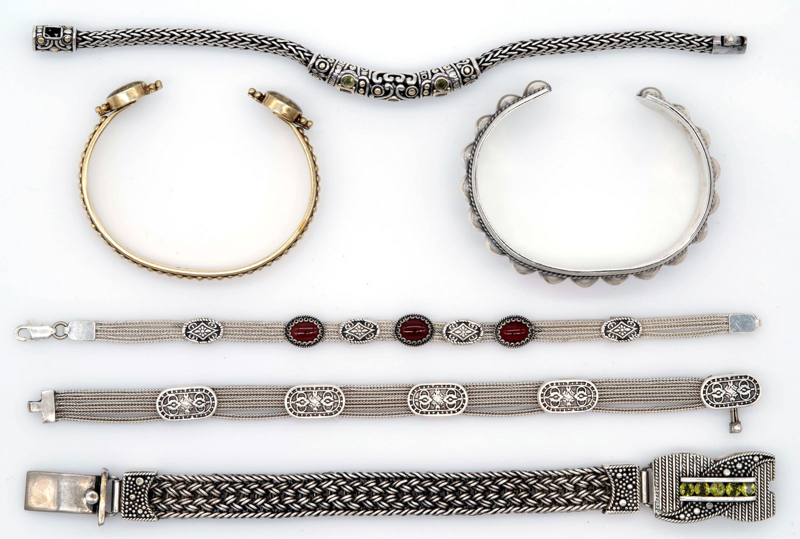 Lot of Six Sterling Silver Bracelets, 179.84g: Lot of Six Sterling Silver Bracelets, 179.84g. To include: 2 cuff bracelets both marked "Mex 925" and one marked "AJ 65". 4 bracelets with clasps all marked "925" and one with inset tourmalines. Longe