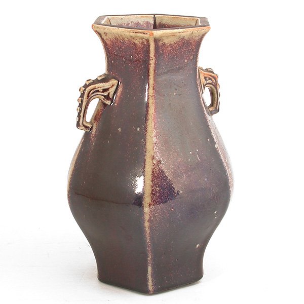 Hexagonal brown glaze vase with elephant handles.: VASE. Hexagonal brown glaze vase with elephant handles, 12"h x 8"d, very good condition.