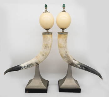 Anthony Redmile Horn, Ostrich Egg & Malachite Garniture: Pair of opposing designer garniture by Anthony Redmile. Composed of mounted horn above an extruded metal and wood base. The horn finished with silverplate moldings and adorned with ostrich eggs and