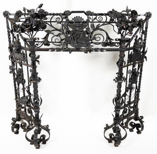 Victorian Wrought Iron Fireplace Surround: Victorian Wrought Iron Fireplace Surround. Ornately decorated with flowers and vines. Appx. 40" tall x 42 1/2" wide x 15" deep. Opening: 29" tall x 23" wide. Very good condition.
