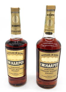 2 Bottles 1972 & 1975 I.W. Harper Kentucky Whiskey: 2 Bottles of I.W. Harper Kentucky Straight Bourbon Whiskey. Sealed with tax strips intact: "I.W. Harper Distilling Company". "Spring 1970 Spring 1975" and "Spring 1967 Spring 1972". 100 proof, 4/5