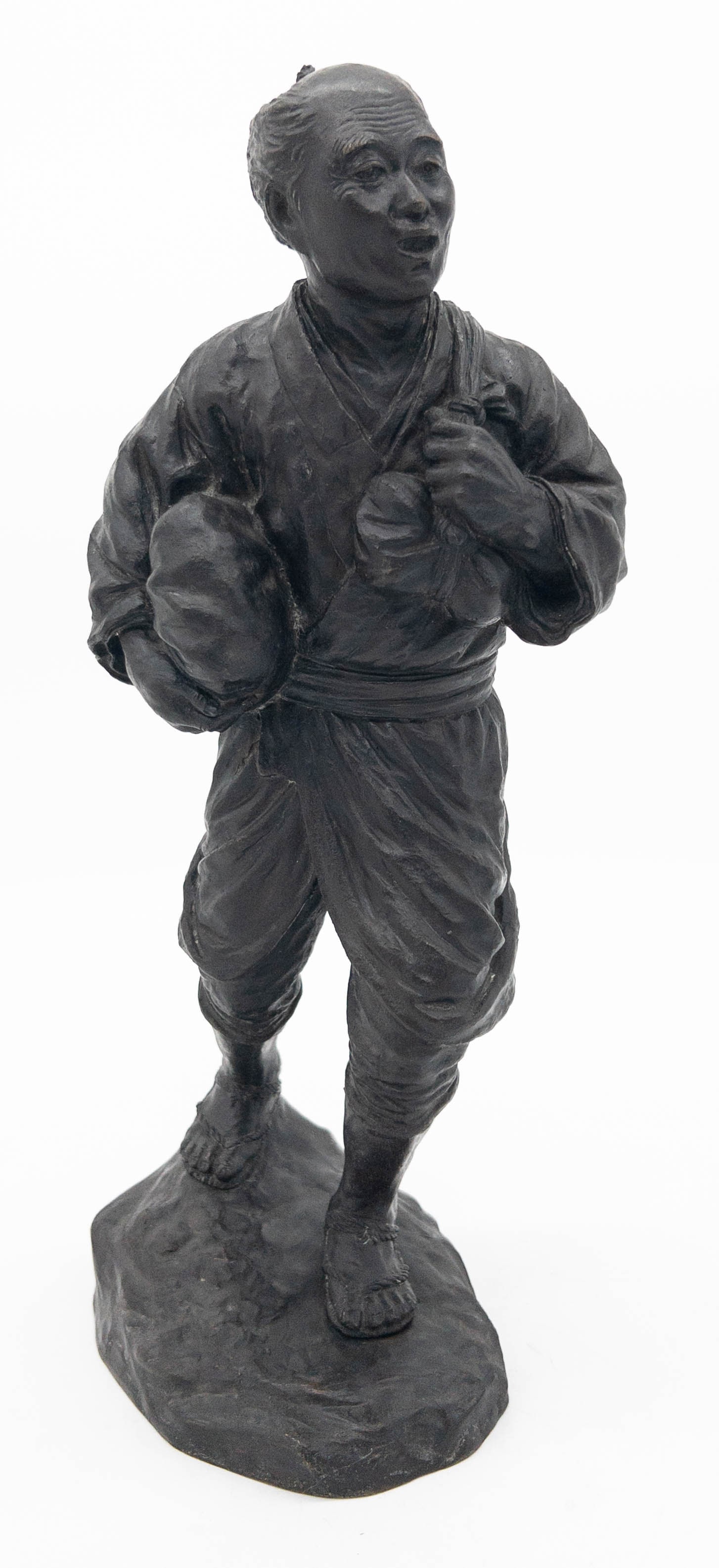 Japanese Bronze Statue of Man with Bundle (1 of 5)