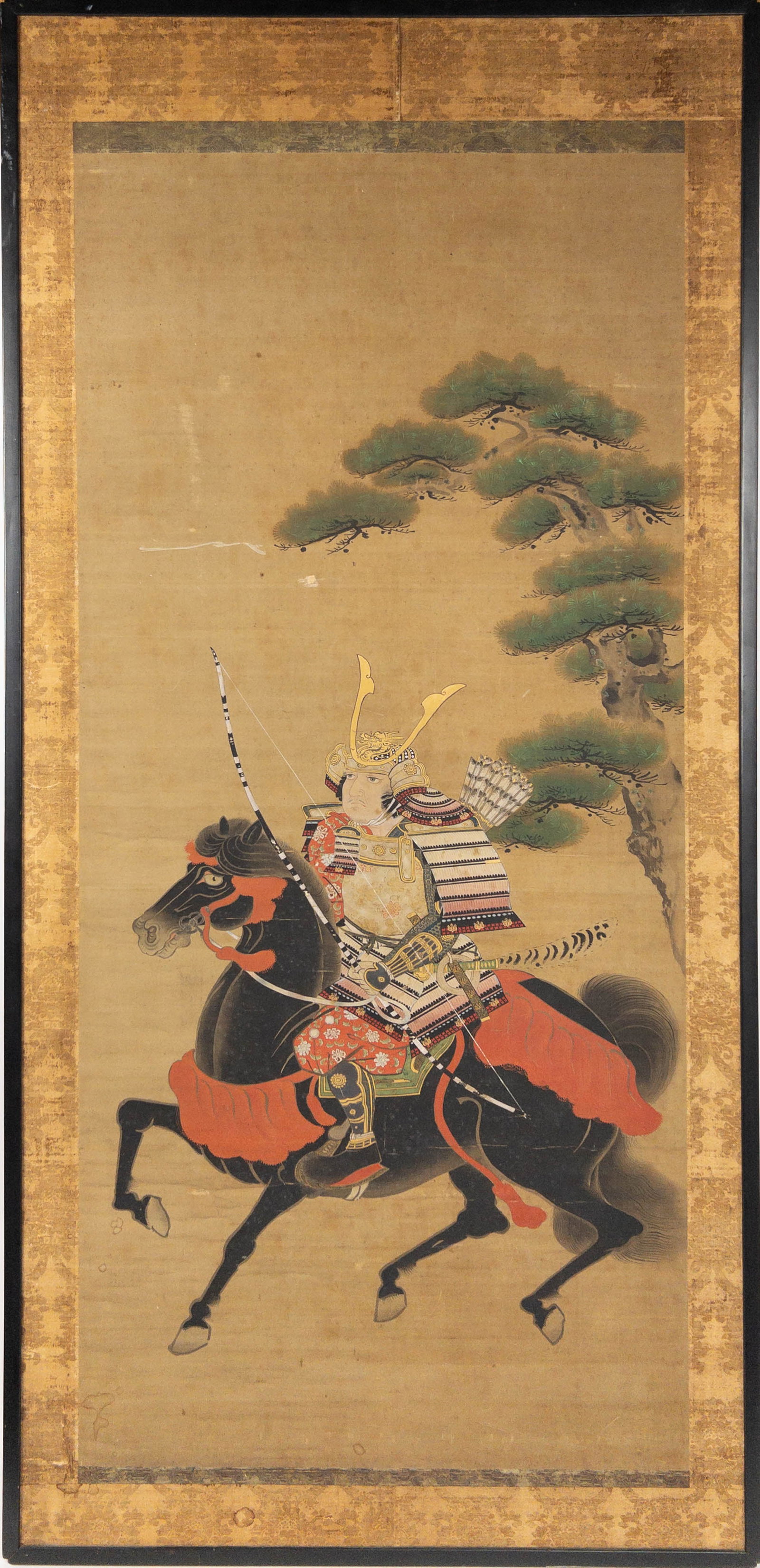 Minamoto no Yoshitsune Samurai Japanese Silk Painting: Minamoto no Yoshitsune Samurai Japanese Painting on Silk. Possibly 19th century. No apparent signature. Laid down on board, surrounded by decorative silk textile border. Scuffing to left of tree as sh