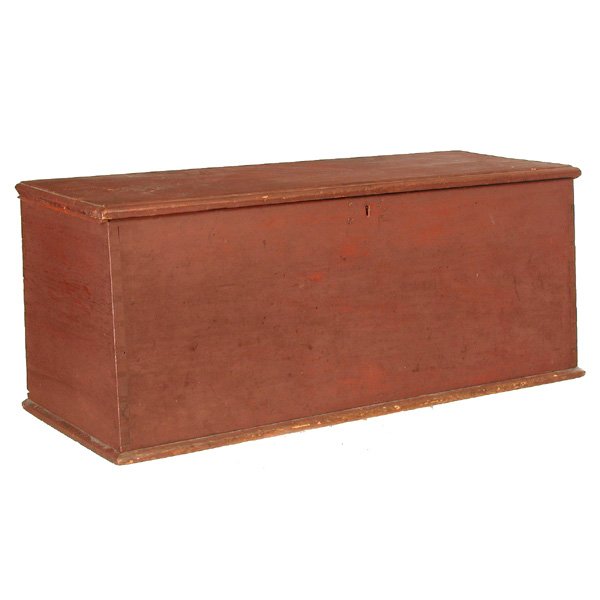 New England Ship Chest: New England Ship Chest, the trapezoidal shape with dove tail joinery and lift top in original red paint, 19 1/2"h x 48 1/2" w x 17 1/2"d, very good original condition.