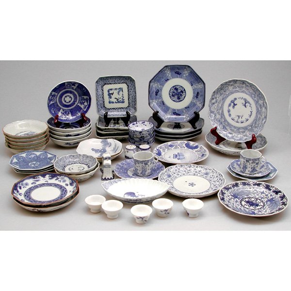 Lot of Japanese Blue & White Porcelain, 36 count: Miscellaneous lot of Japanese blue & white porcelain dishes to include: bowls, plates, cups, saucers, salt and pepper shakers, and dishes, 36 pieces. Largest plate measures 8" diameter, in very good c