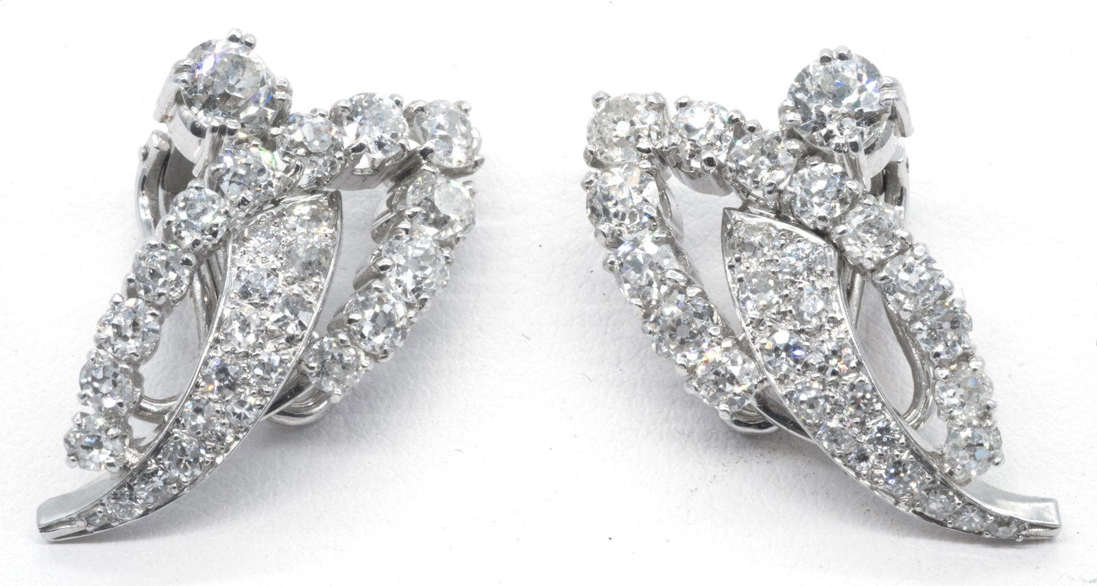 14k White Gold & Diamond Clip Earrings. Each with appx 1/4ct diamond surrounded (1 of 2)