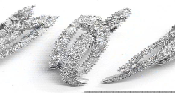 14k White Gold & Diamond Clip Earrings. Each with appx 1/4ct diamond surrounded: 14k White Gold & Old Mine Cut Diamond Clip Earrings. Each featuring a 0.25ct diamond and surrounded by a tear drop shape arch with thirteen smaller graduated diamonds. In the center a diamond