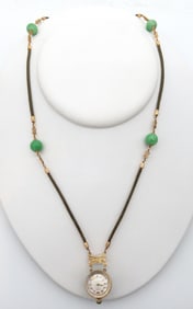 Piaget jade pendant watch and jade accented necklace