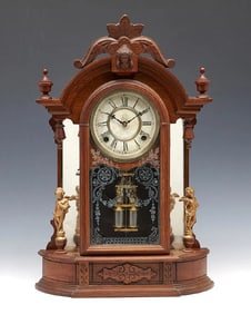 Waterbury walnut mantel clock with figures