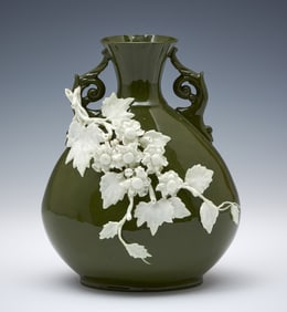 Lotus Ware, KTK, olive green Umbrian vase with white flowers