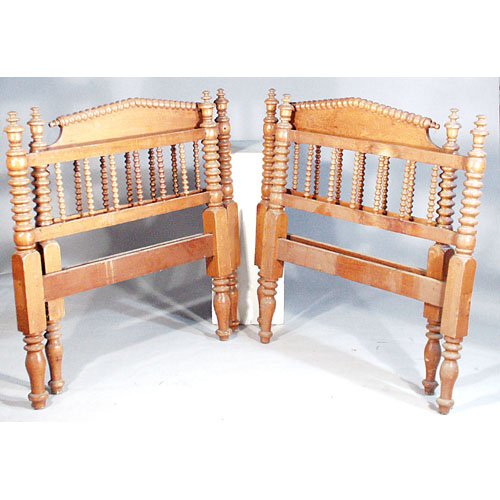 Pair Of Jenny Lind Beds.: BEDS. Pair of Jenny Lind pine spool beds, twin size. 39" x 76" x 43". Good original condition.