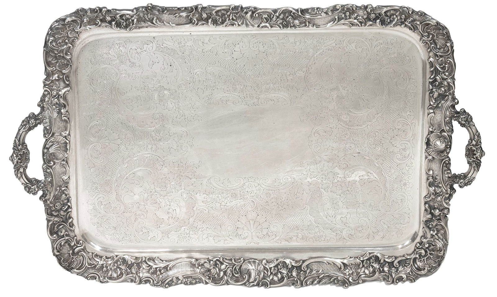 Oversized English Sterling Silver Two Handled Tray: Oversized English Sterling Silver Two Handled Tray. With high relief edge border in floral and shell motif. The main center of tray engraved in floral and shell form swags throughout. Marked on back w
