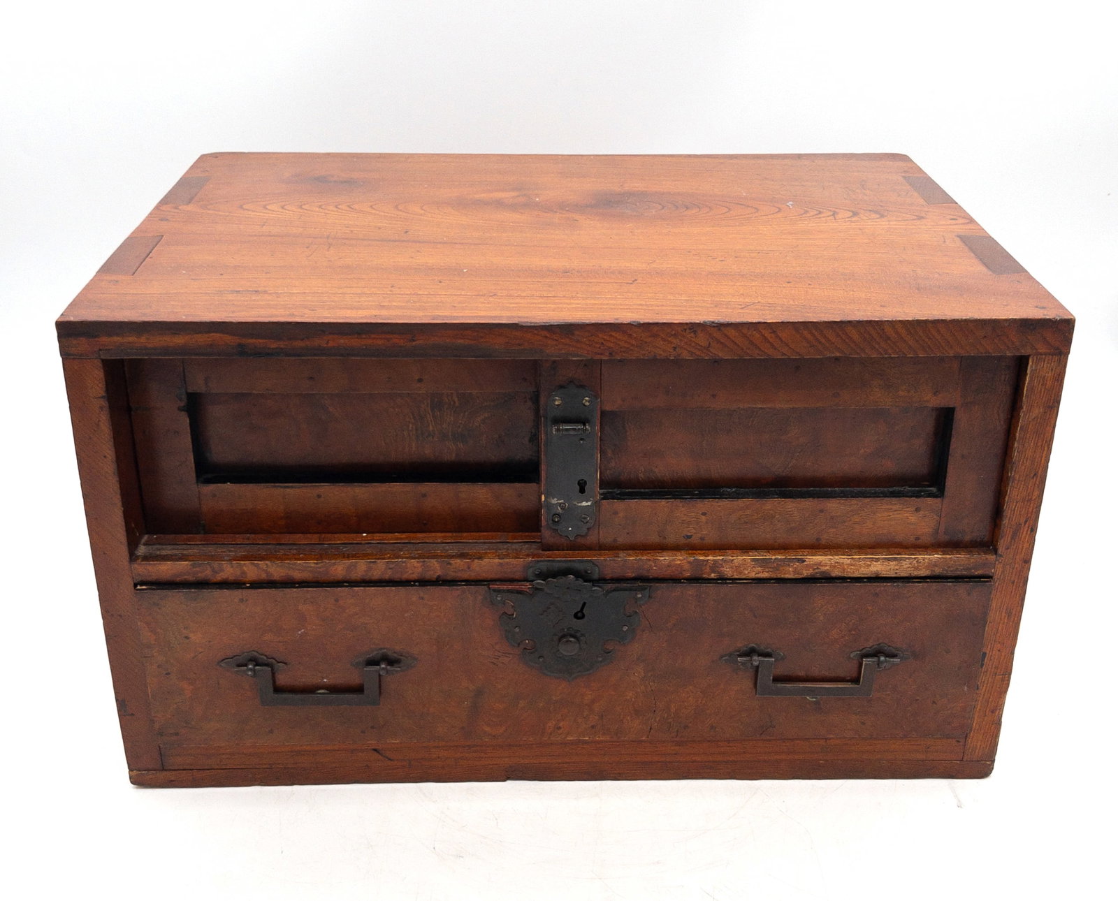 19th C. Japanese Miniature Tansu w/ Sliding Door: 19th C. Japanese Miniature Tansu w/ Sliding Door and drawered interior. Dovetailed construction with fancy hardware. Measures appx 10 1/2" tall x 18 1/4" wide x 12 3/4" deep.